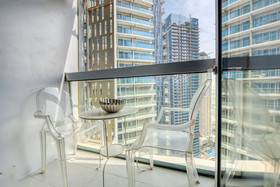 Cayan Tower by  Raine & Horne Holiday Homes
