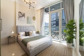 Luxe Apartments near Dubai Mall, Burj Khalifa - Pool, Gym, & Parking by Sojo Stay