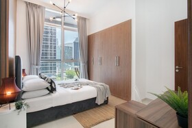 Luxe Apartments near Dubai Mall, Burj Khalifa - Pool, Gym, & Parking by Sojo Stay