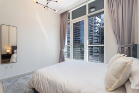 Luxe Apartments near Dubai Mall, Burj Khalifa - Pool, Gym, & Parking by Sojo Stay