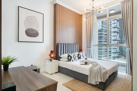 Luxe Apartments near Dubai Mall, Burj Khalifa - Pool, Gym, & Parking by Sojo Stay