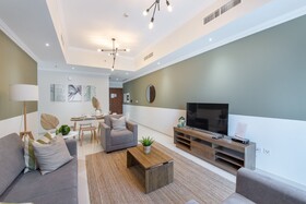 Luxe Apartments near Dubai Mall, Burj Khalifa - Pool, Gym, & Parking by Sojo Stay