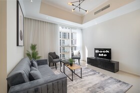 Luxe Apartments near Dubai Mall, Burj Khalifa - Pool, Gym, & Parking by Sojo Stay