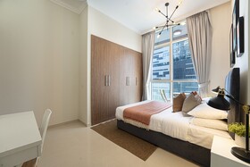 Luxe Apartments near Dubai Mall, Burj Khalifa - Pool, Gym, & Parking by Sojo Stay