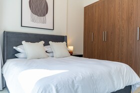 Luxe Apartments near Dubai Mall, Burj Khalifa - Pool, Gym, & Parking by Sojo Stay