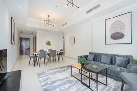 Luxe Apartments near Dubai Mall, Burj Khalifa - Pool, Gym, & Parking by Sojo Stay