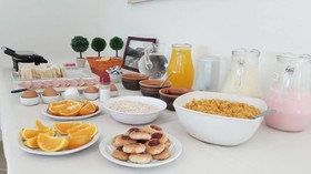 Apart Hotel el Jardin de los Presentes