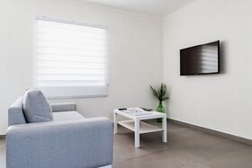 The Palm Leaf Apartments