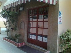 Al Commodore Suites