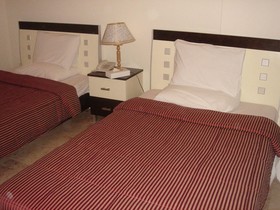 Al Commodore Suites