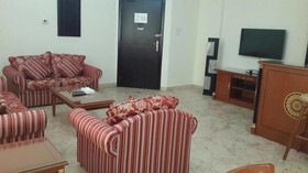 Al Commodore Suites