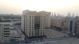 Al Commodore Suites