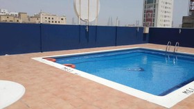 Al Commodore Suites