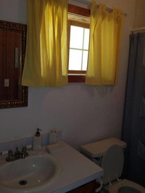 Wheel House Downstairs by Living Easy Abaco