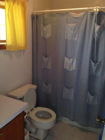 Wheel House Downstairs by Living Easy Abaco