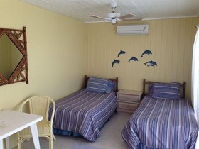 Wheel House Downstairs by Living Easy Abaco