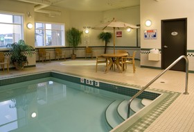 Merit Hotel & Suites