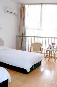 Qingdao Xiaogangwan Business Hotel