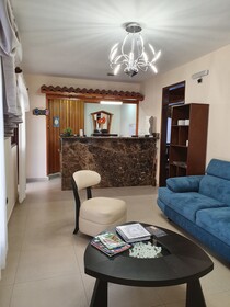 Suites Merlyn Aeropuerto