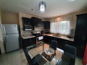 Suites Merlyn Aeropuerto