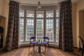 The Alchemist Apartments