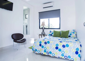 Malecon Rooms & Hotel