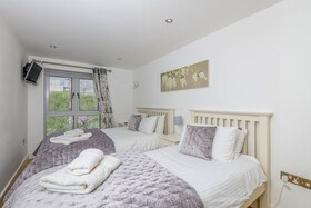 The Beach House & Porth Sands Apartments