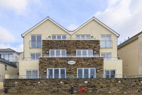 The Beach House & Porth Sands Apartments