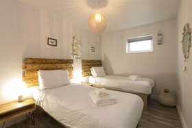 The Beach House & Porth Sands Apartments