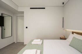 Ostrakon Suites