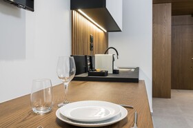 Ostrakon Suites