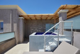 Sea Breeze Santorini Beach Resort, Curio Collection by Hilton