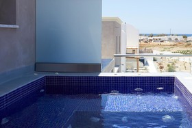 Sea Breeze Santorini Beach Resort, Curio Collection by Hilton