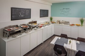 Escala Hotel & Suites