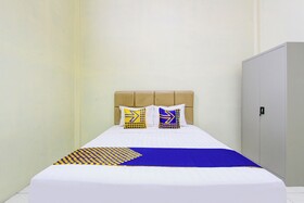 Spot On 93245 Guet House Mulia Dua Syariah