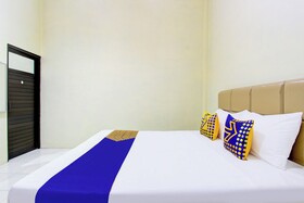 Spot On 93245 Guet House Mulia Dua Syariah