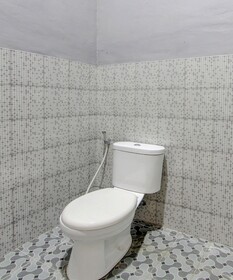 Spot On 93245 Guet House Mulia Dua Syariah