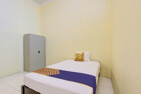 Spot On 93245 Guet House Mulia Dua Syariah