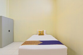 Spot On 93245 Guet House Mulia Dua Syariah