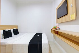 Capital O 93266 Palmier Hotel