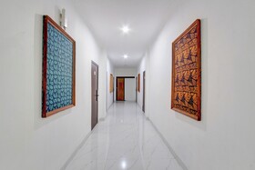 Capital O 93266 Palmier Hotel