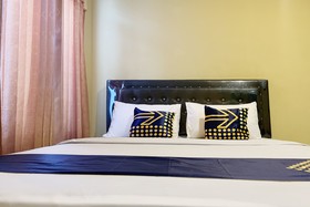 Mande Guesthouse by RedDoorz