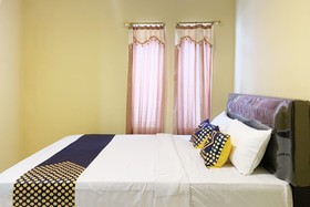 Mande Guesthouse by RedDoorz