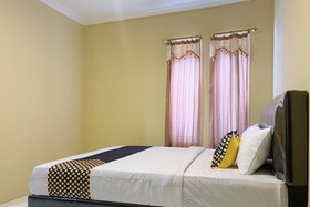 Mande Guesthouse by RedDoorz