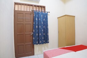 Spot On 91977 Kost Ketapang Syariah