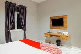 Super Oyo Capital O Papakoel Hotel & Cafe