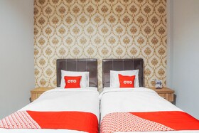 Super Oyo Capital O Papakoel Hotel & Cafe