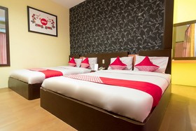Thyesza Hotel by OYO Rooms