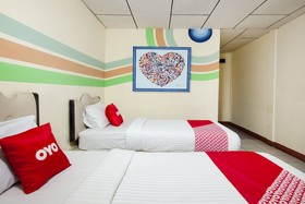 Thyesza Hotel by OYO Rooms