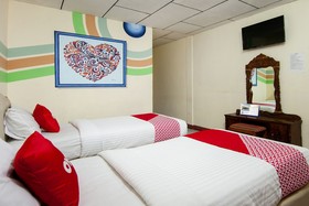 Thyesza Hotel by OYO Rooms